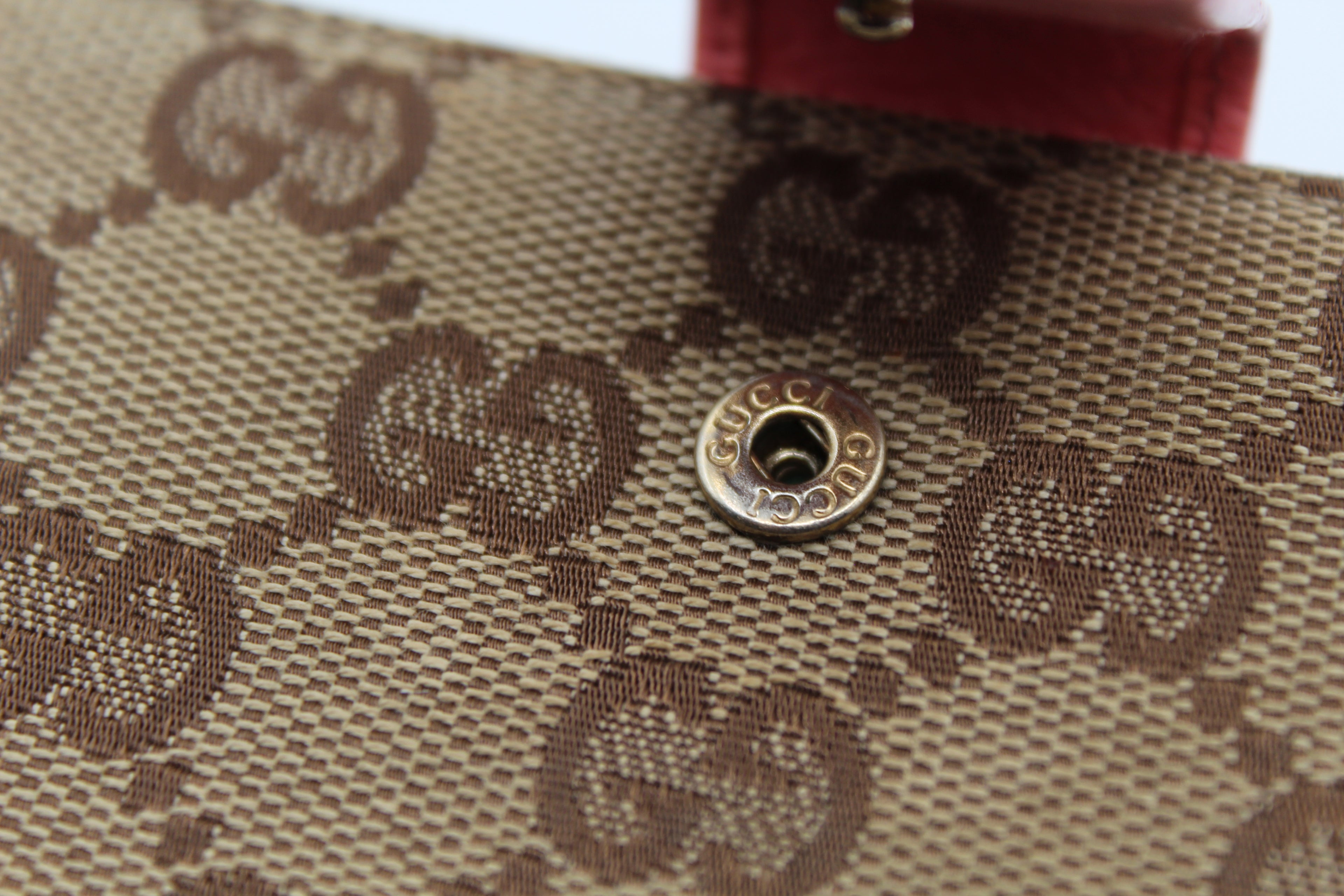 Gucci GG Canvas Eclipse Bifold Wallet