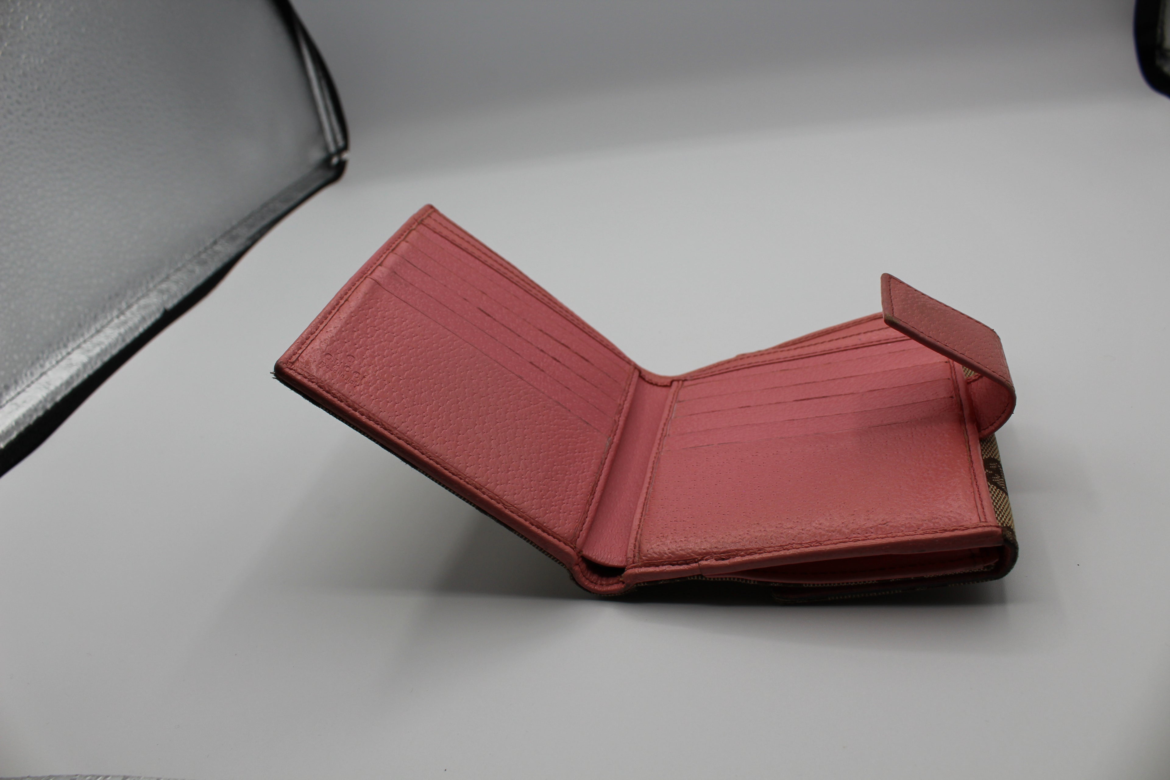 Gucci GG Canvas Eclipse Bifold Wallet