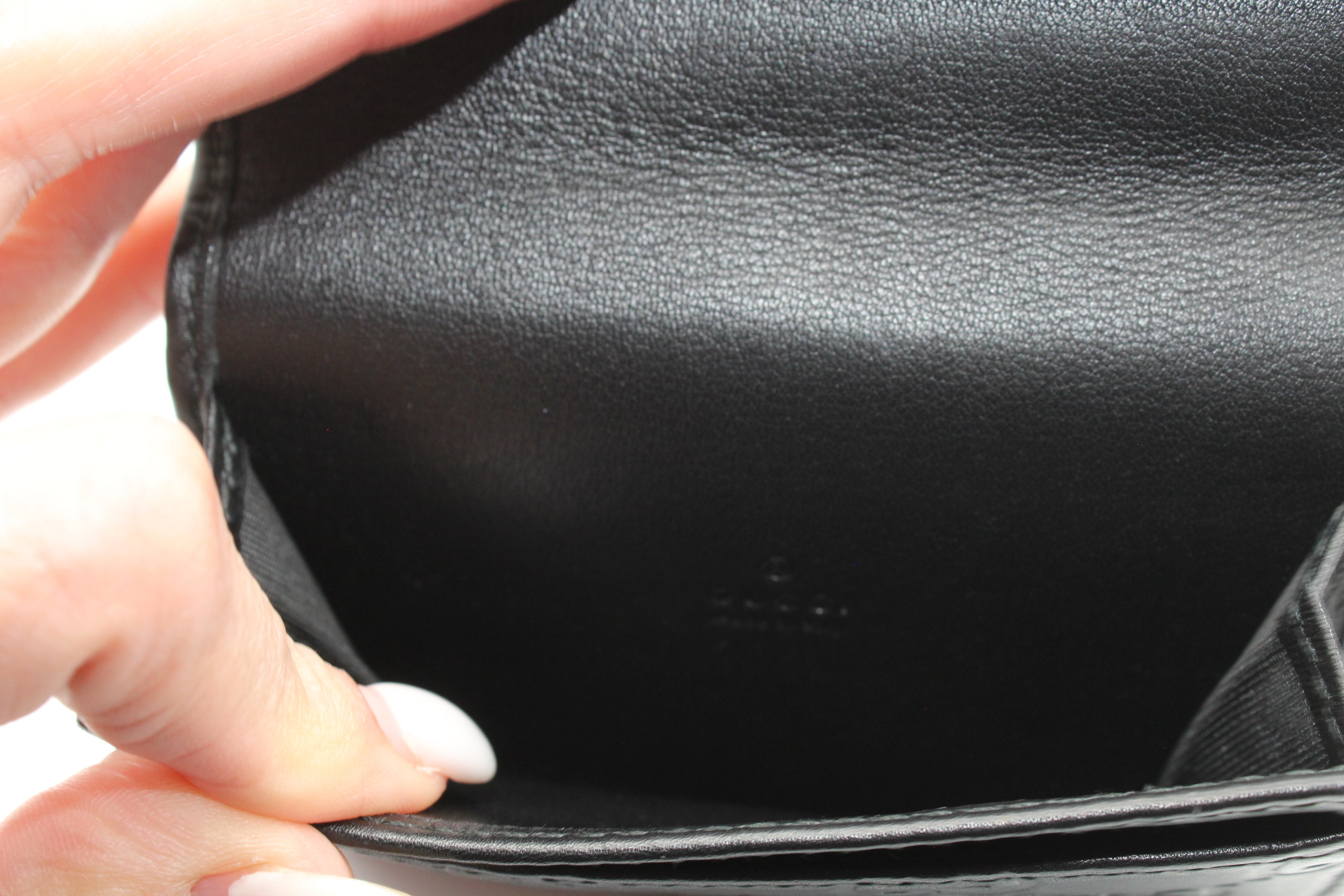Gucci Guccissima Embossed Leather Compact Wallet — Black