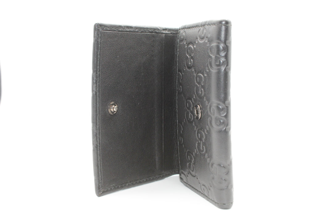 Gucci Guccissima Embossed Leather Compact Wallet — Black